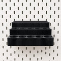 Shelf mounted on SKADIS pegboard, 15 paint wells