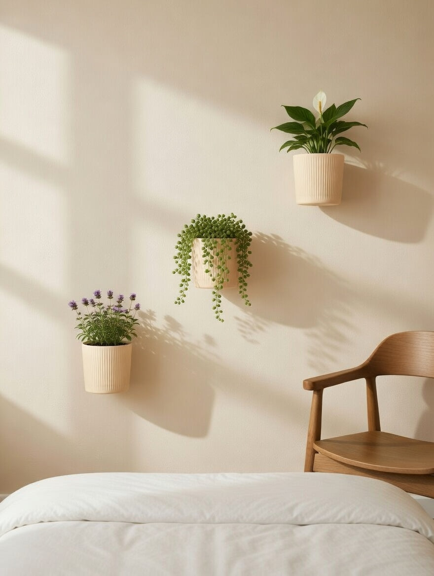 Beige round fluted wall planters above a bed in a styled bedroom
