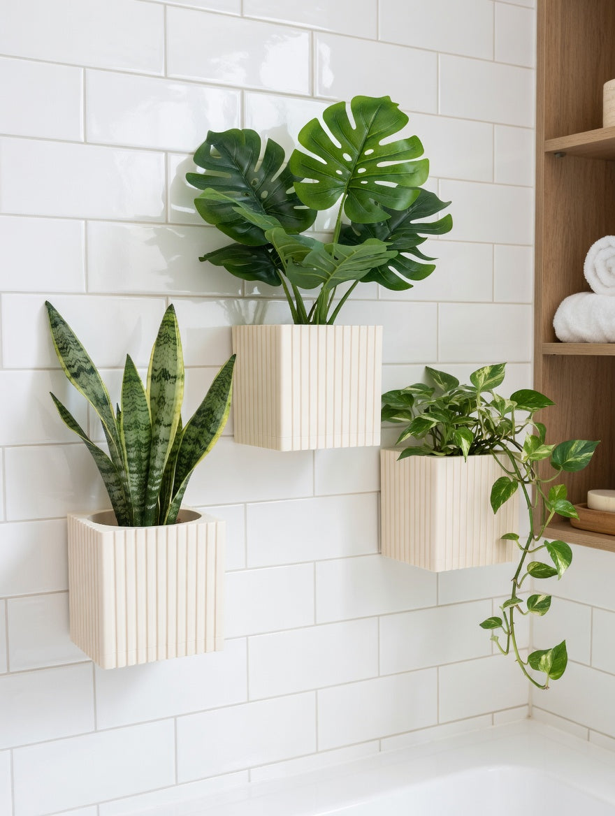 Square fluted wall planter bringing greenery to a tiled bathroom