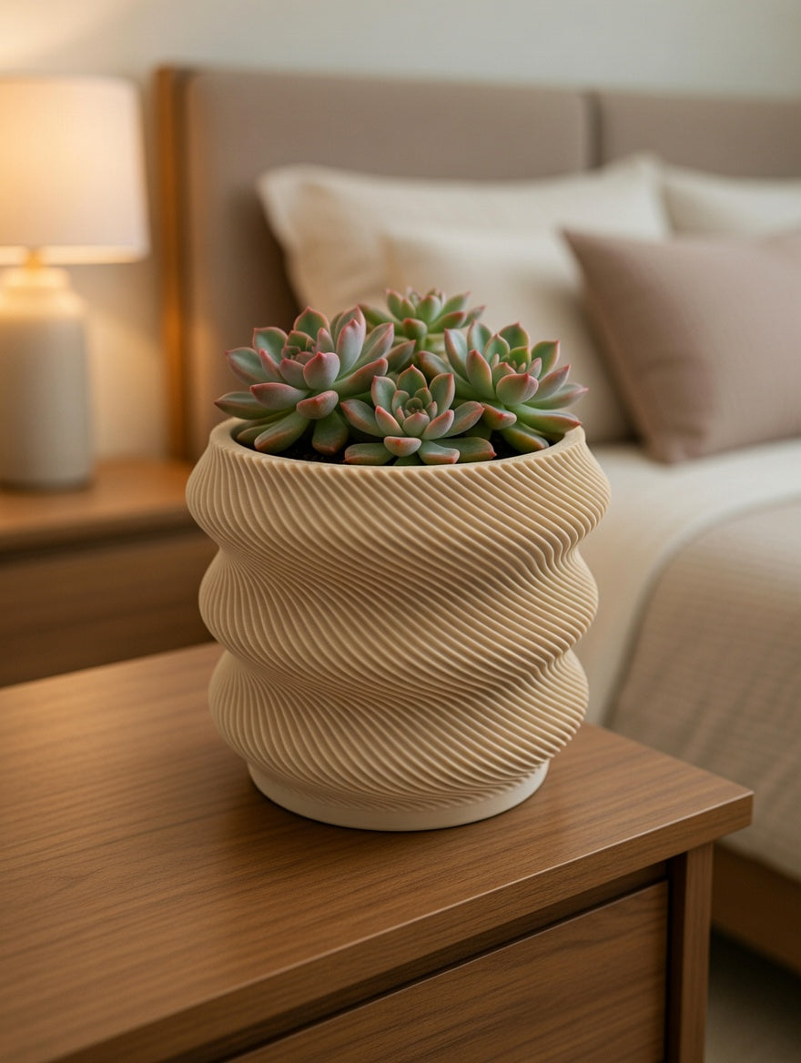 Wavy desk planter with succulent on a bedroom nightstand