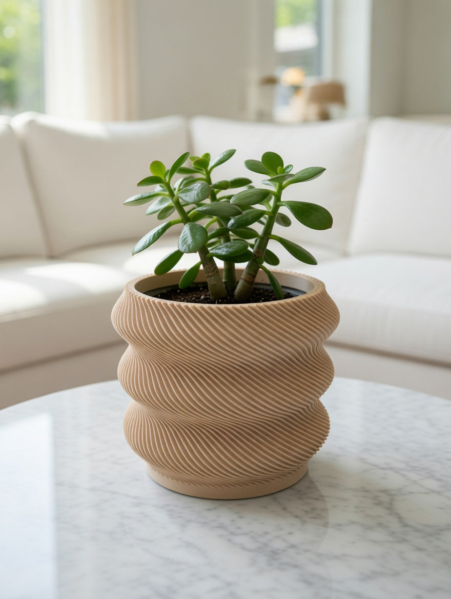 Wavy desk planter with jade plant on a marble table in a living room