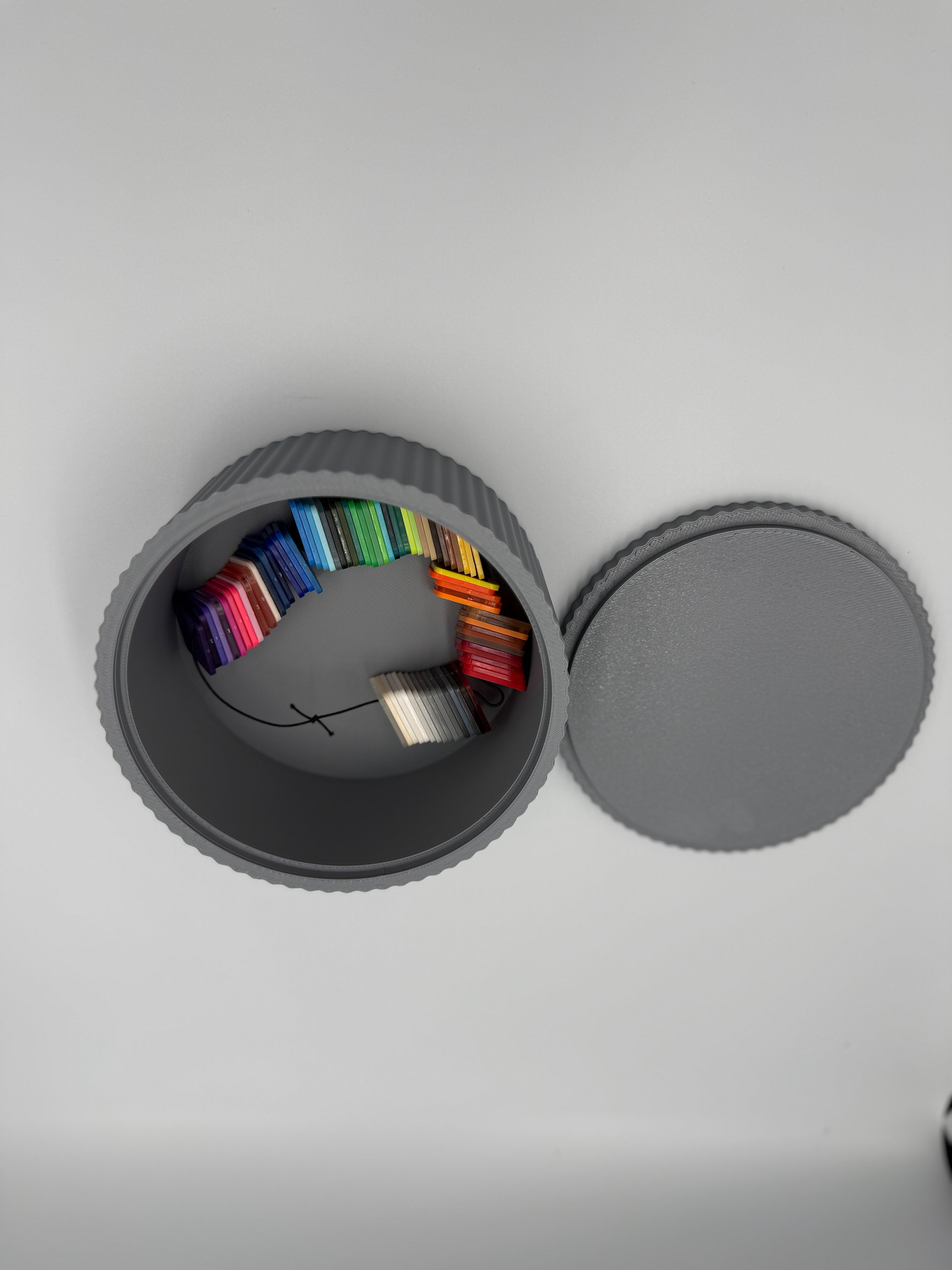 Grey fluted storage box shown from a top angle