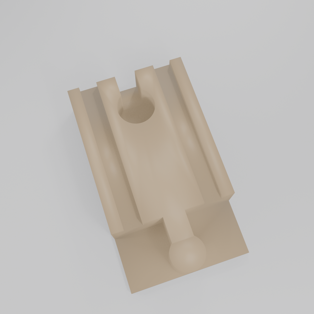 Top view of the track adapter showing wheel grooves and peg and socket connectors