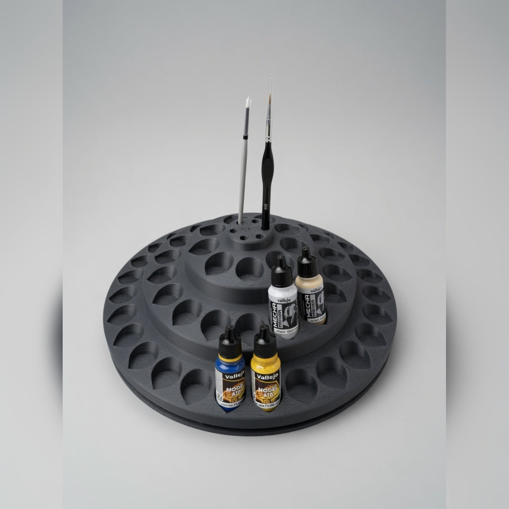 Rotating paint carousel with dropper bottles and brushes, hero shot