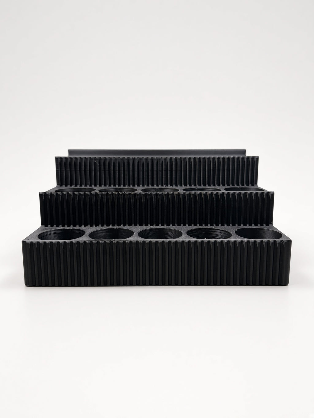 SKADIS Paint Shelf front view - 3 fluted tiers, studio shot