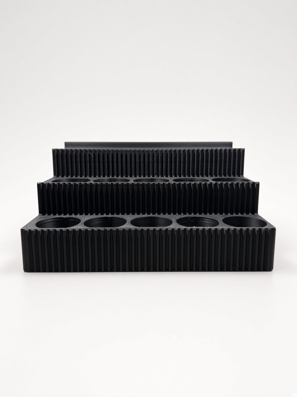 SKADIS Paint Shelf front view - 3 fluted tiers, studio shot
