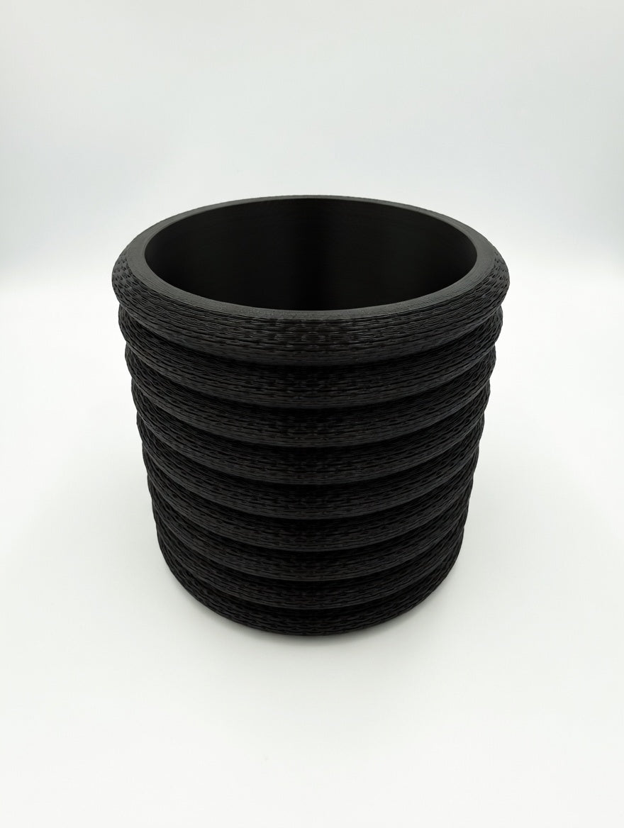 Knit Stack planter showing stacked puffy rings and knit-stitch detail
