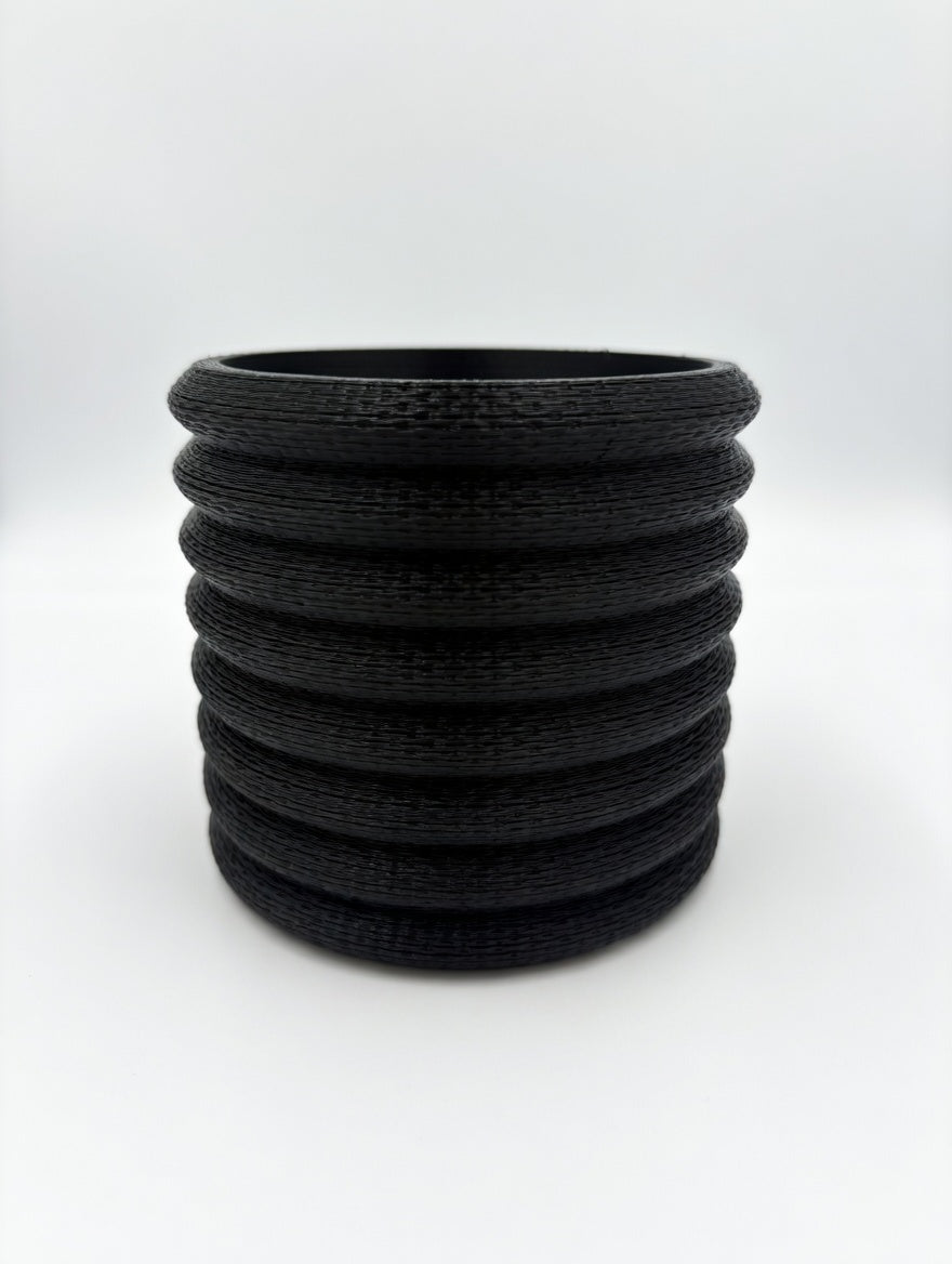 Knit Stack desk planter with twist-lock drip tray attached