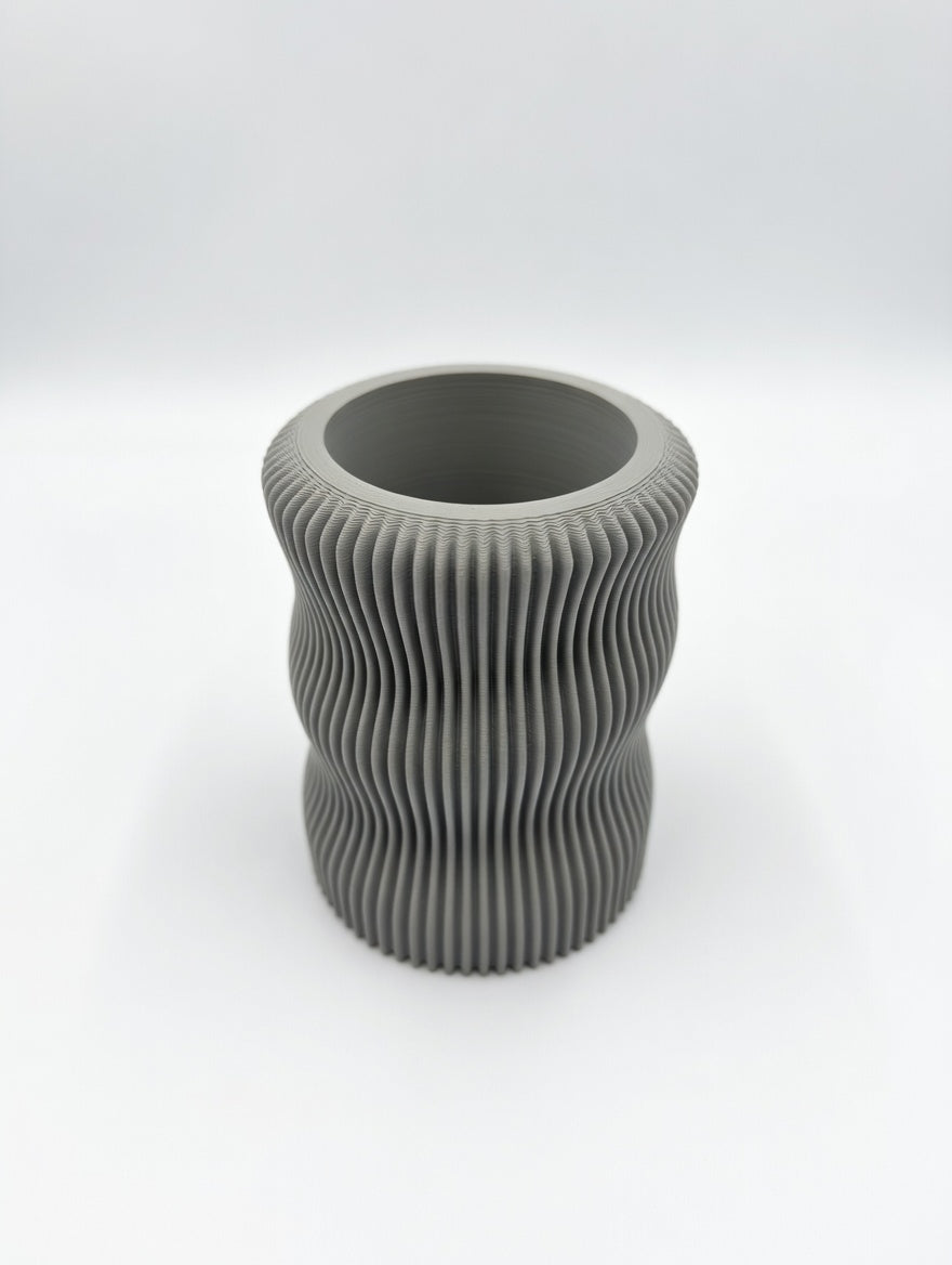 Soft organic fluted pencil holder styled in a modern home office