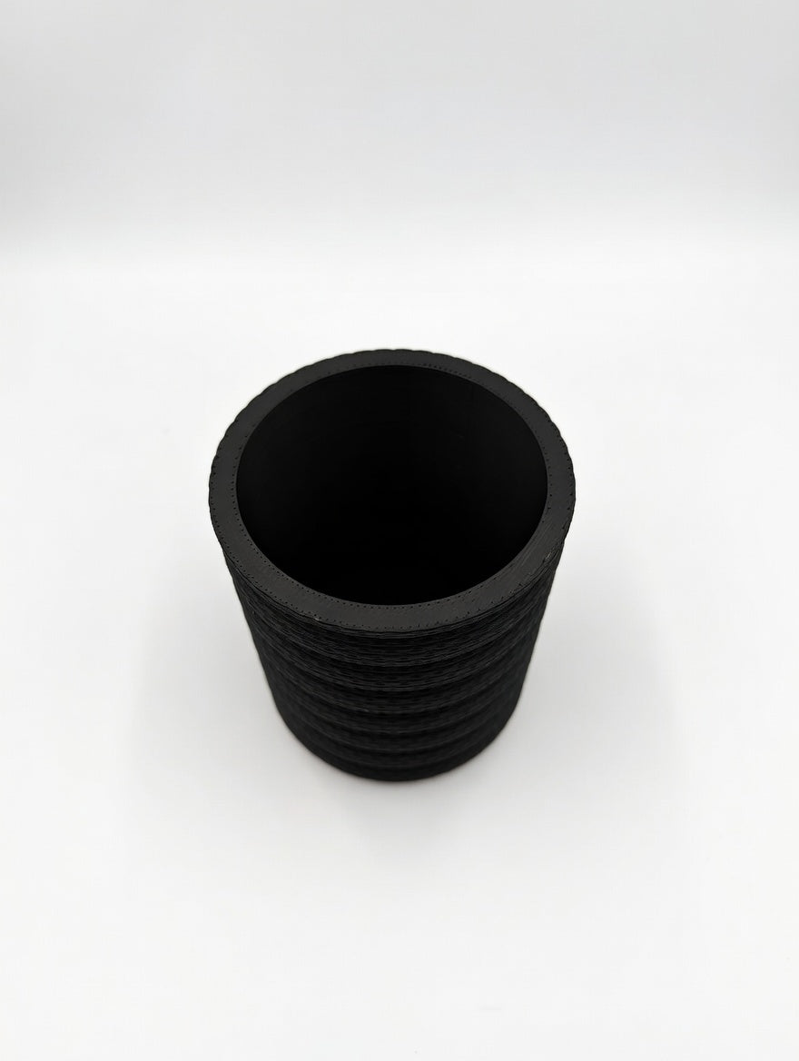 Matte black Knit Stack pencil holder studio shot on white background