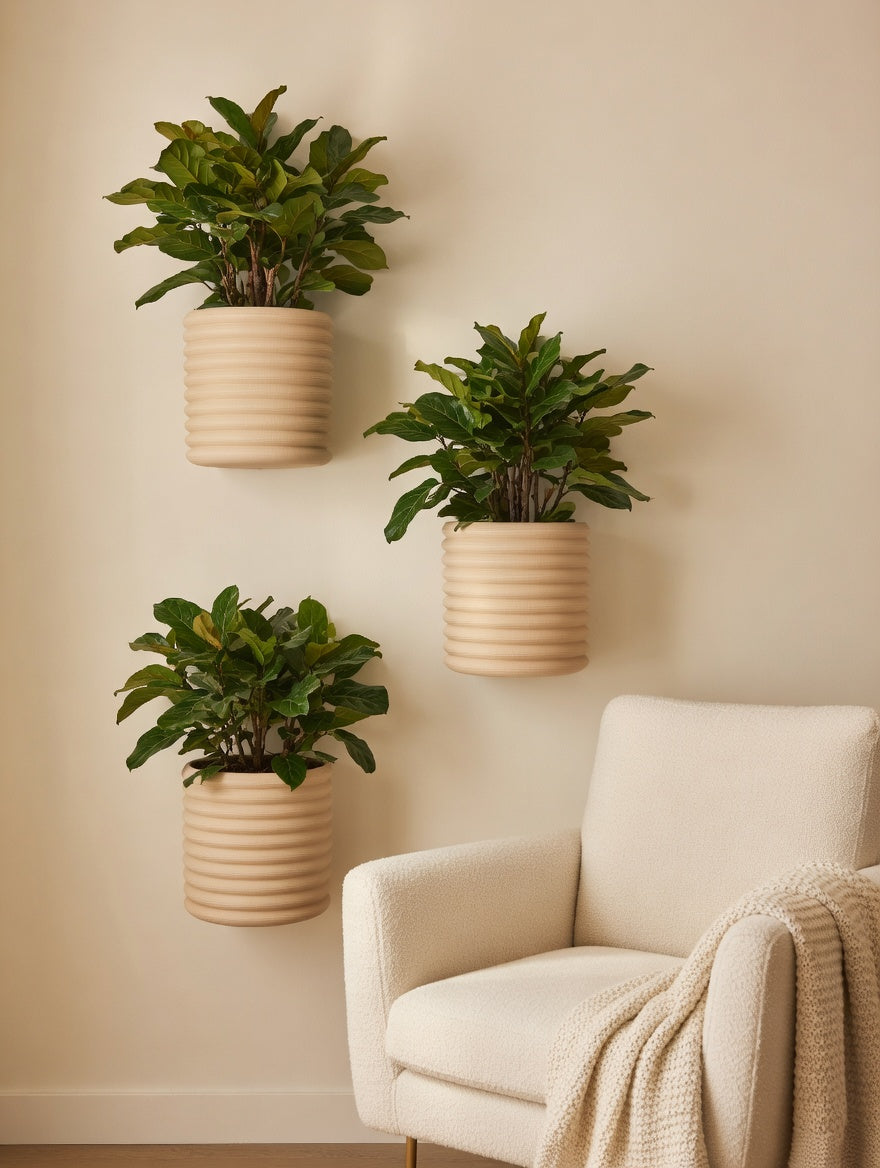 Knit Stack wall planter mounted on a living room wall in natural light