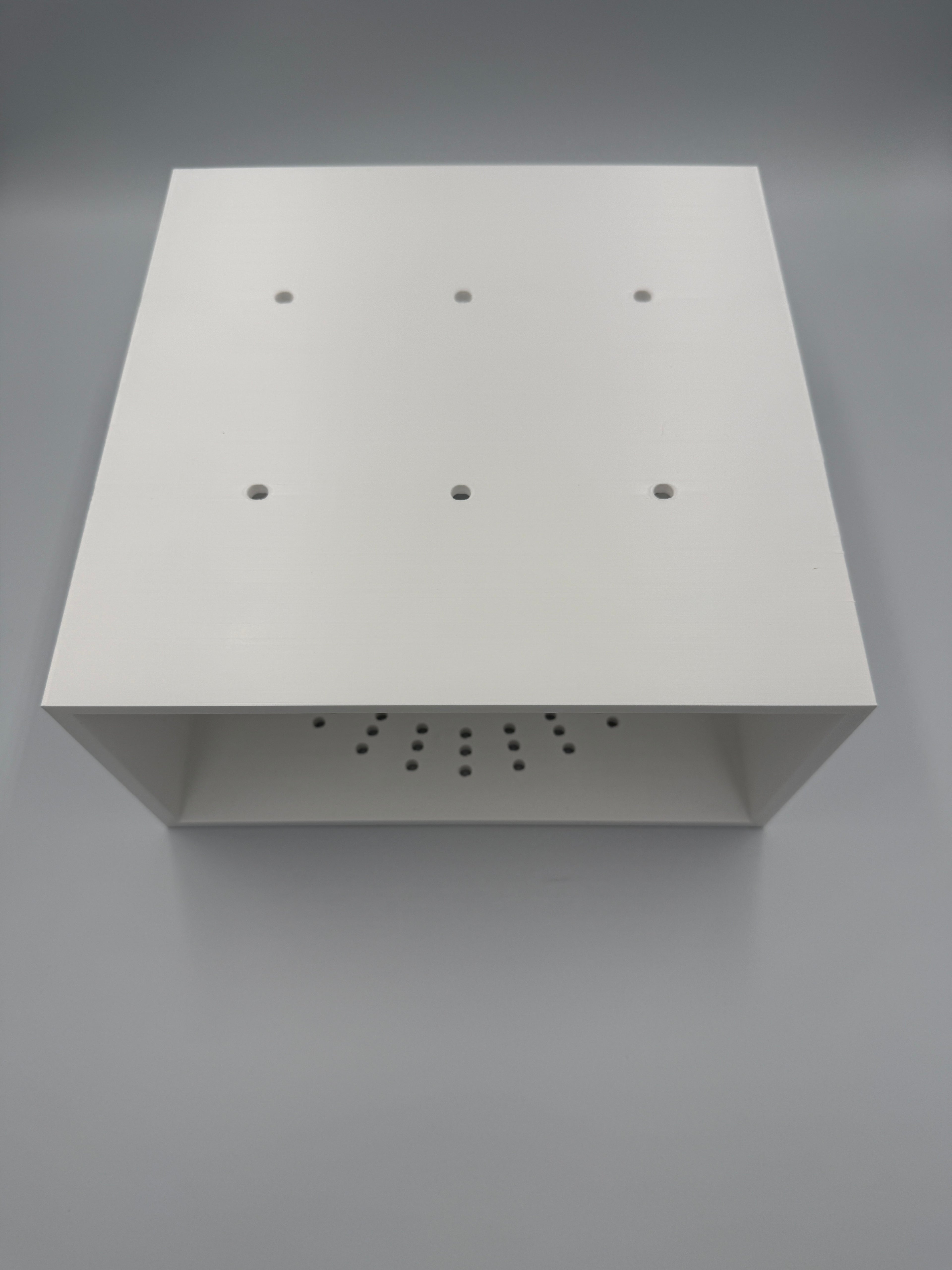 Top plate with 6 centred screw holes and open back for cable access