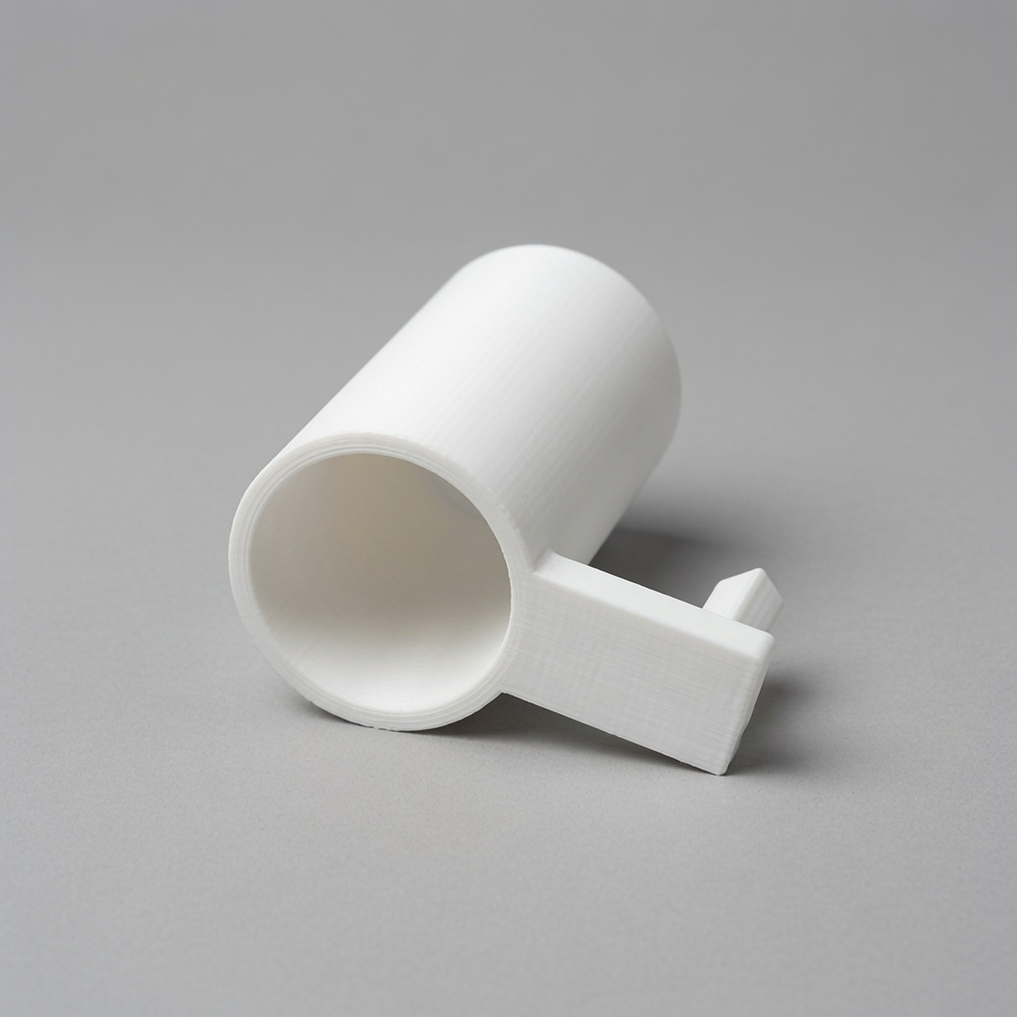 Brush holder cup mouth and pin arm