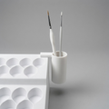 Clip-on brush holder mounted on a Formada3D paint rack, holding brushes