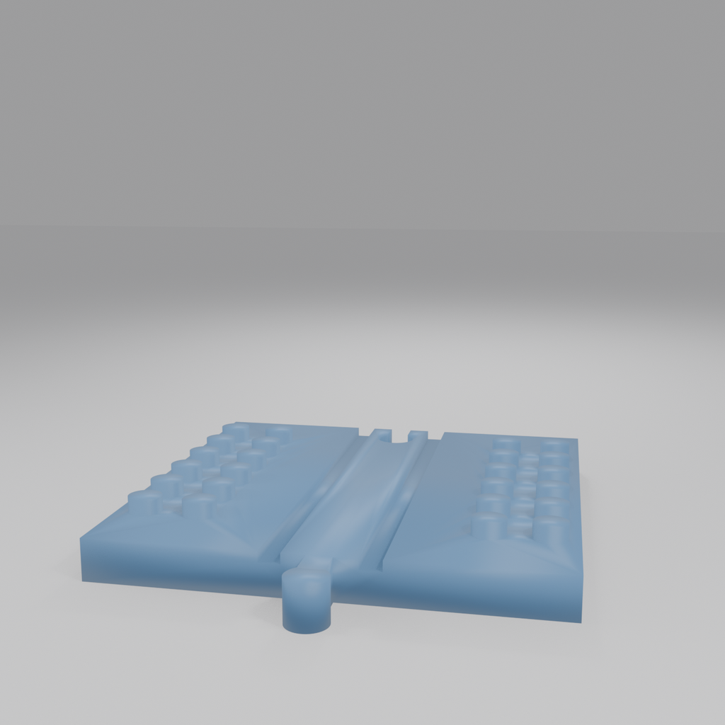 Front view of the train track DUPLO baseplate tile showing the track lane and studs