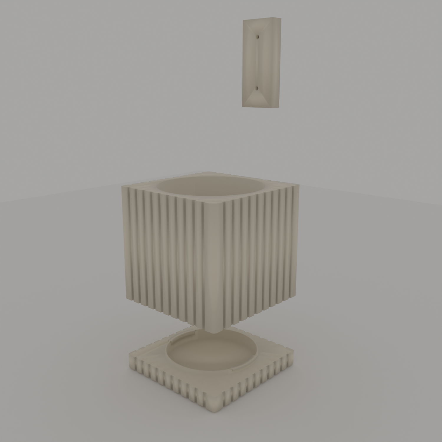 Exploded view of the 3-piece square wall planter system: planter box, drip tray and dovetail bracket