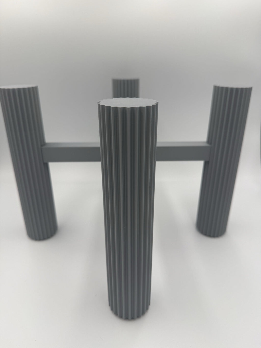 Close-up of the fluted column leg with 24 vertical channels