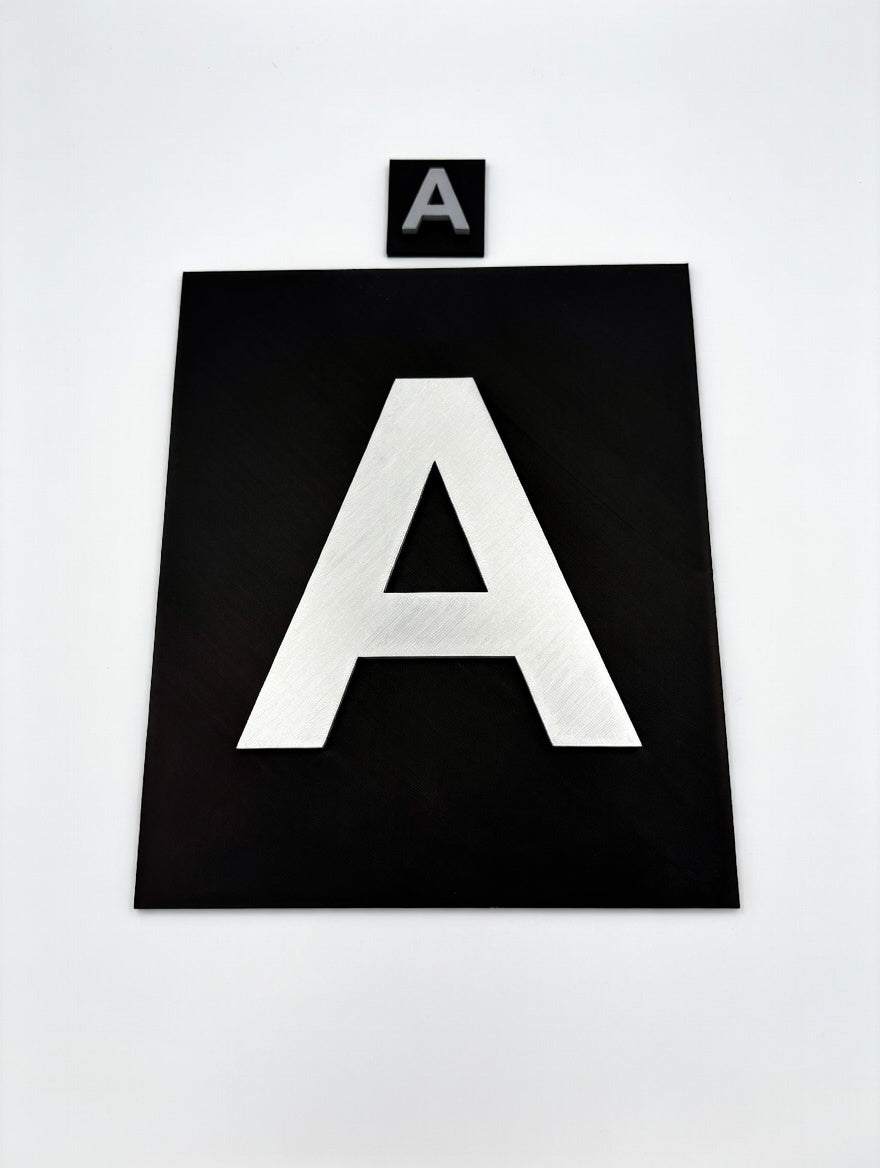 Extra large and extra small shadow letter A size comparison