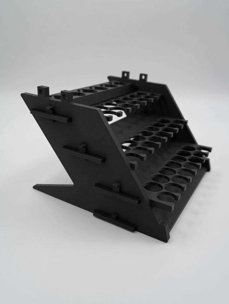 Formada3D Straight Tower flat-pack paint rack kit, matte black, studio view with bottle wells visible