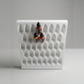 White wall-mounted paint rack 38 with Vallejo bottles