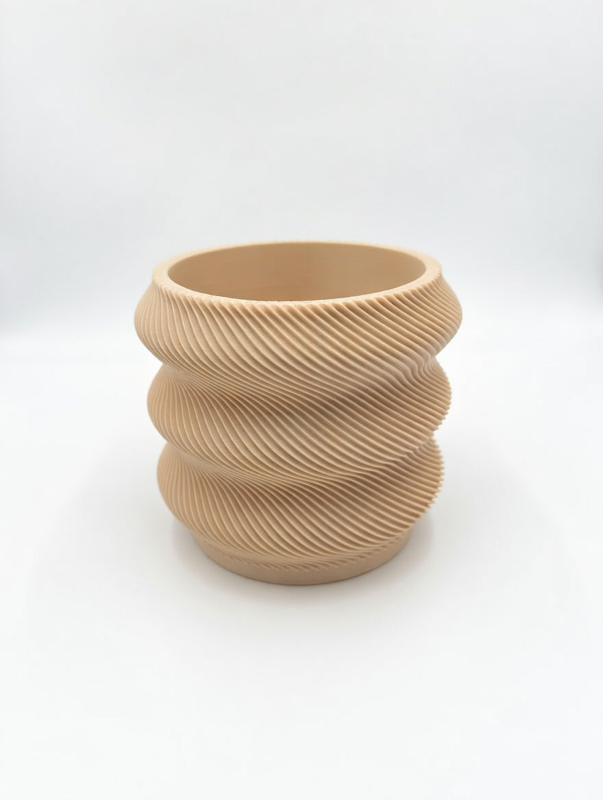 Wavy Twisted Fluted Desk Planter in Matte Beige, angled view showing spiral flutes